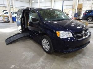 Blue Dodge Grand Caravan with BraunAbility Side Entry Manual Fold Out conversion