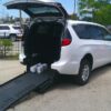 White Chrysler Voyager with BraunAbility Rear Entry Manual Fold Out conversion