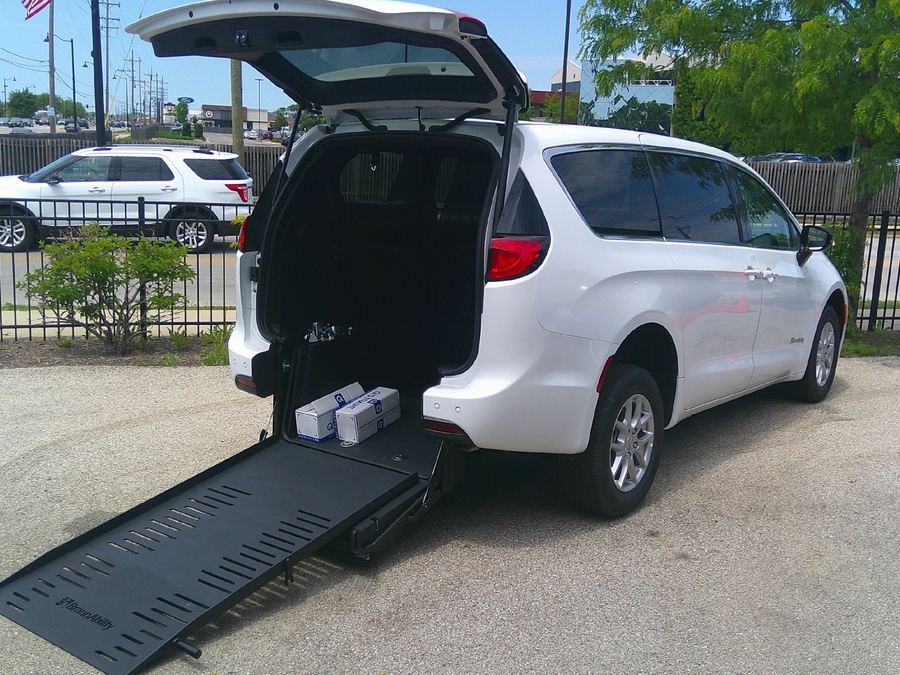 White Chrysler Voyager with BraunAbility Rear Entry Manual Fold Out conversion