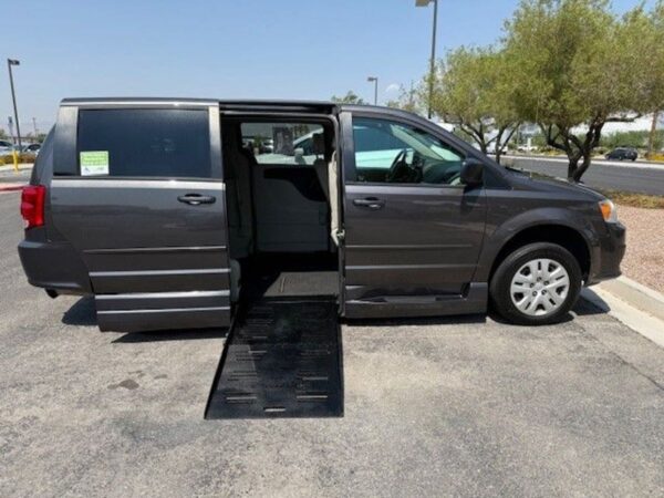 Grey Dodge Grand Caravan with BraunAbility Side Entry Automatic Fold Out conversion