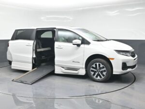 White Honda Odyssey with BraunAbility Side Entry Automatic In Floor conversion