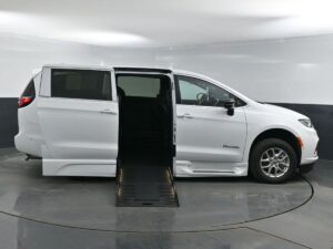 White Chrysler Pacifica with BraunAbility Side Entry Automatic Fold Out conversion