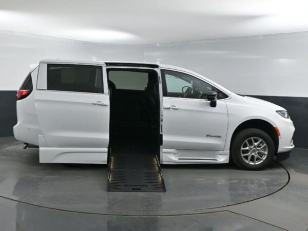 White Chrysler Pacifica with BraunAbility Side Entry Automatic Fold Out conversion