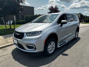 Silver Chrysler Pacifica with BraunAbility Side Entry Automatic Fold Out conversion