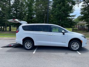 White Chrysler Voyager with BraunAbility Rear Entry Manual Fold Out conversion