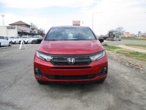 Red Honda Odyssey with BraunAbility Side Entry Automatic In Floor conversion