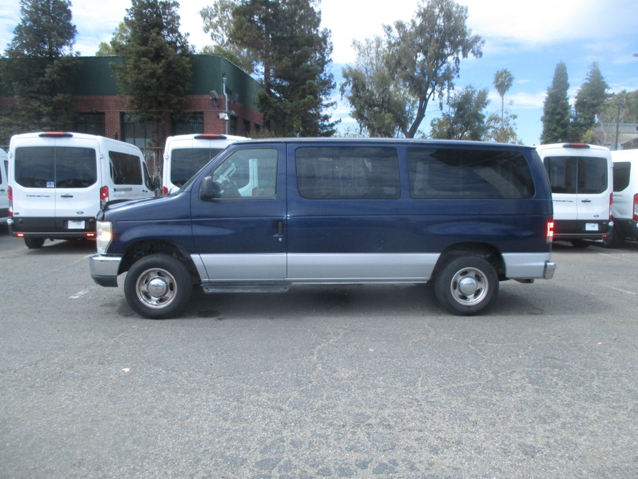 Blue-grey Ford Econoline with Other Side Entry Automatic Fold Out conversion