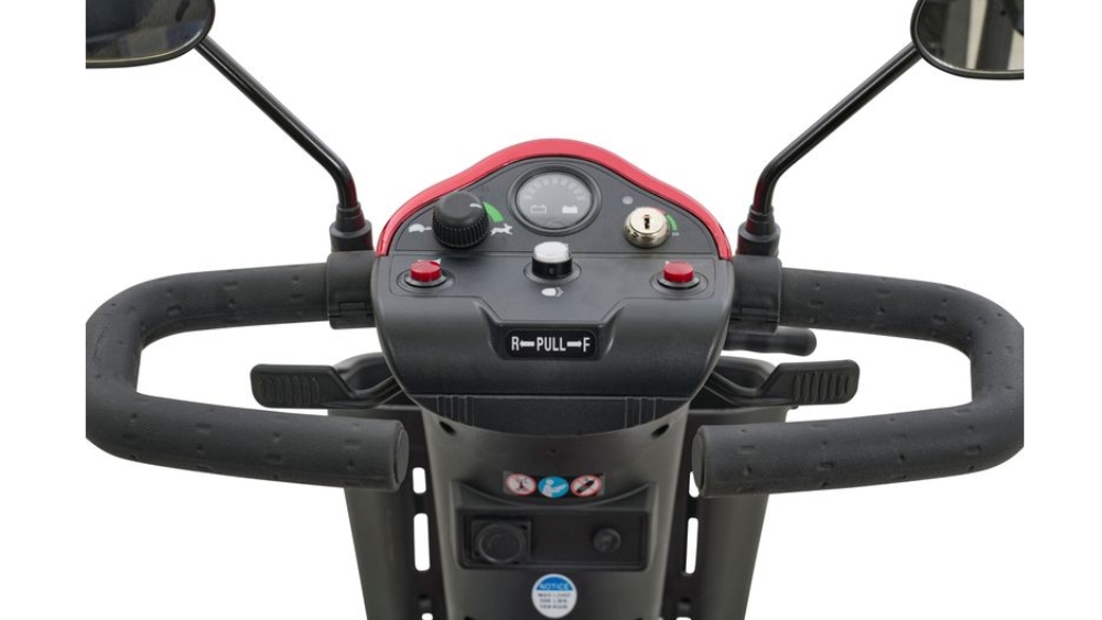 Close-up view of the Companion Mid-Size 3-Wheel Scooter dashboard featuring handlebars, control buttons, a speed dial, ignition key slot, and mirrors against a white background.