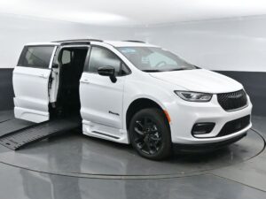 White Chrysler Pacifica with BraunAbility Side Entry Automatic Fold Out conversion