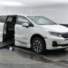 White Honda Odyssey with BraunAbility Side Entry Automatic In Floor conversion