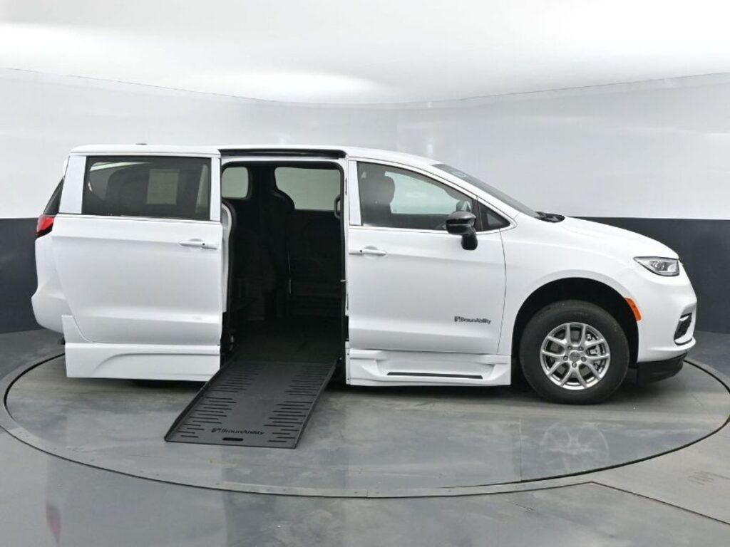 White Chrysler Pacifica with BraunAbility Side Entry Automatic Fold Out conversion