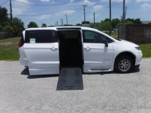 White Chrysler Pacifica with BraunAbility Side Entry Automatic Fold Out conversion