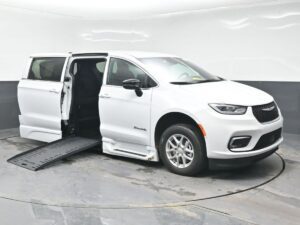 White Chrysler Pacifica with BraunAbility Side Entry Automatic Fold Out conversion