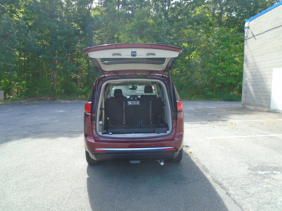 Red Chrysler Pacifica with Vantage Mobility Side Entry Automatic In Floor conversion
