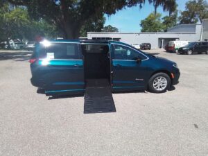 Blue Chrysler Pacifica with BraunAbility Side Entry Automatic Fold Out conversion