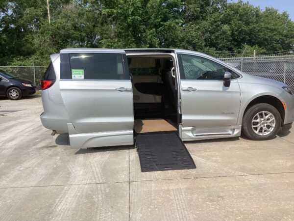 Silver Chrysler Voyager with BraunAbility Side Entry Automatic Fold Out conversion