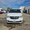 White Dodge Grand Caravan with BraunAbility Side Entry Automatic Fold Out conversion