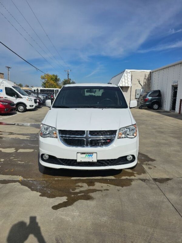 White Dodge Grand Caravan with BraunAbility Side Entry Automatic Fold Out conversion