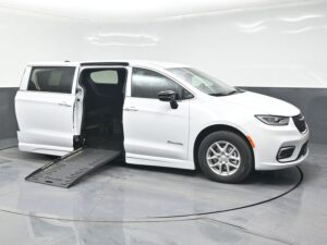 White Chrysler Pacifica with BraunAbility Side Entry Automatic Fold Out conversion