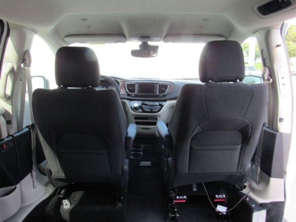 White Chrysler Voyager with Driverge Side Entry Automatic Fold Out conversion