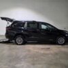 Black Toyota Sienna with Driverge Rear Entry Manual Fold Out conversion