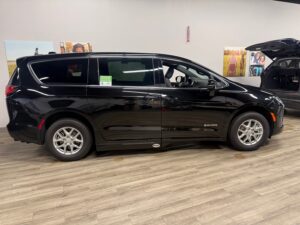 Black Chrysler Pacifica with Driverge Side Entry Automatic Fold Out conversion