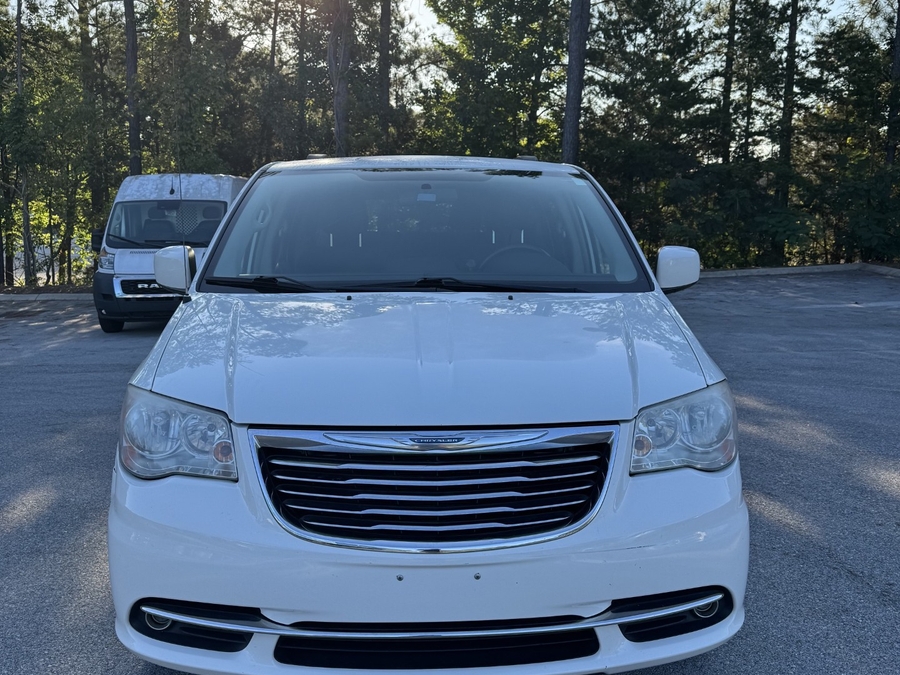 Stone White Chrysler Town and Country with BraunAbility Side Entry Automatic Fold Out conversion