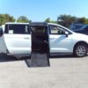 White Chrysler Voyager with BraunAbility Side Entry Automatic Fold Out conversion