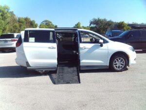 White Chrysler Voyager with BraunAbility Side Entry Automatic Fold Out conversion