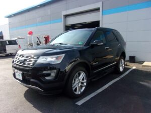 Black Ford Explorer with BraunAbility Side Entry Automatic In Floor conversion