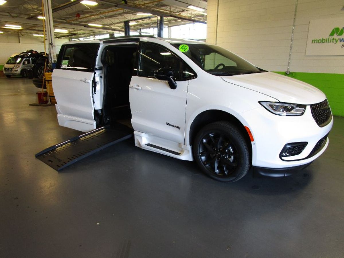 White Chrysler Pacifica with BraunAbility Side Entry Automatic Fold Out conversion