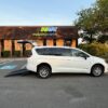 White Chrysler Voyager with BraunAbility Rear Entry Manual Fold Out conversion