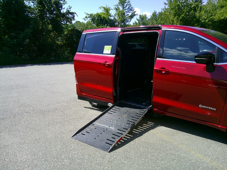Red Chrysler Pacifica with Driverge Side Entry Automatic Fold Out conversion