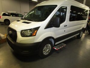 White Ford Transit with Driverge Rear Entry Automatic Fold Out conversion