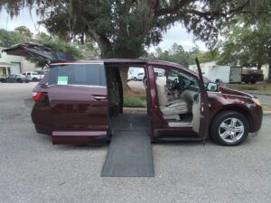 Red Honda Odyssey with Vantage Mobility Side Entry Automatic In Floor conversion
