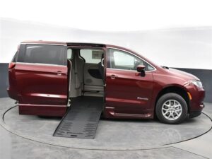 Red Chrysler Voyager with BraunAbility Side Entry Automatic Fold Out conversion
