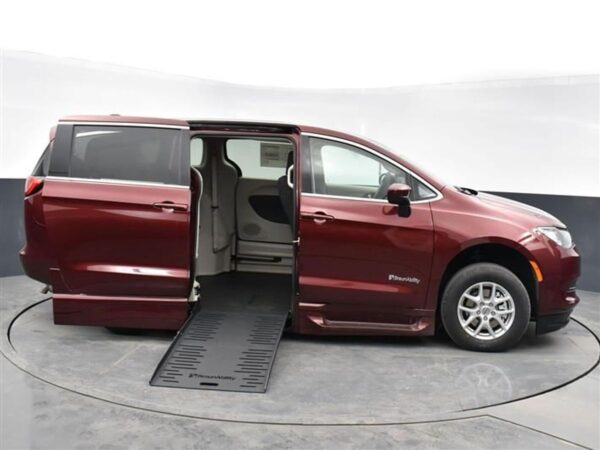 Red Chrysler Voyager with BraunAbility Side Entry Automatic Fold Out conversion