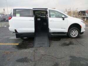 White Chrysler Voyager with BraunAbility Side Entry Manual In Floor conversion