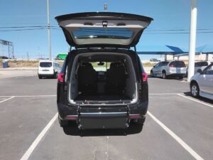 Black Chrysler Pacifica with Driverge Rear Entry Manual Fold Out conversion