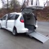 White Chrysler Voyager with Driverge Rear Entry Manual Fold Out conversion