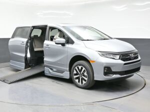 Silver Honda Odyssey with BraunAbility Side Entry Automatic In Floor conversion