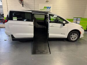 White Chrysler Voyager with BraunAbility Side Entry Manual Fold Out conversion