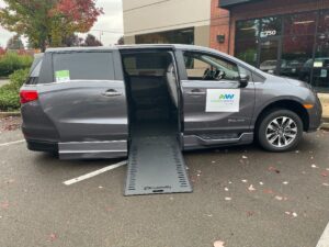 Grey Honda Odyssey with BraunAbility Side Entry Automatic In Floor conversion