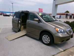 Gold Honda Odyssey with Vantage Mobility Side Entry Automatic In Floor conversion