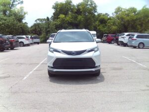 White Toyota Sienna with BraunAbility Side Entry Automatic Fold Out conversion