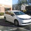 White Chrysler Voyager with Driverge Side Entry Automatic Fold Out conversion