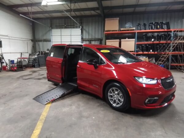 Red Chrysler Pacifica with Driverge Side Entry Automatic Fold Out conversion