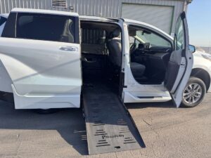 White Toyota Sienna with BraunAbility Side Entry Automatic Fold Out conversion