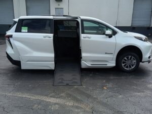 White Toyota Sienna with BraunAbility Side Entry Automatic Fold Out conversion