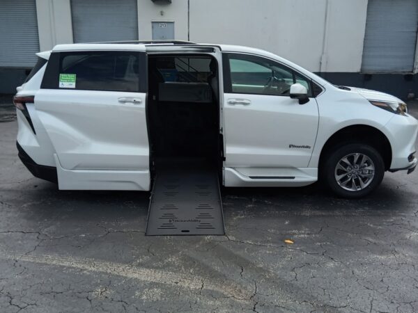 White Toyota Sienna with BraunAbility Side Entry Automatic Fold Out conversion
